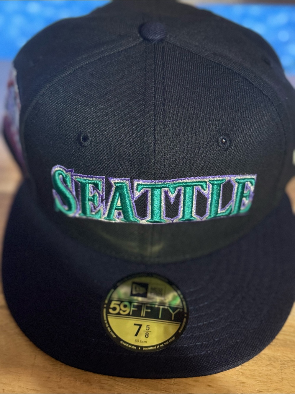 New Era Seattle Embroidered Black Hat with Green and Purple Accents